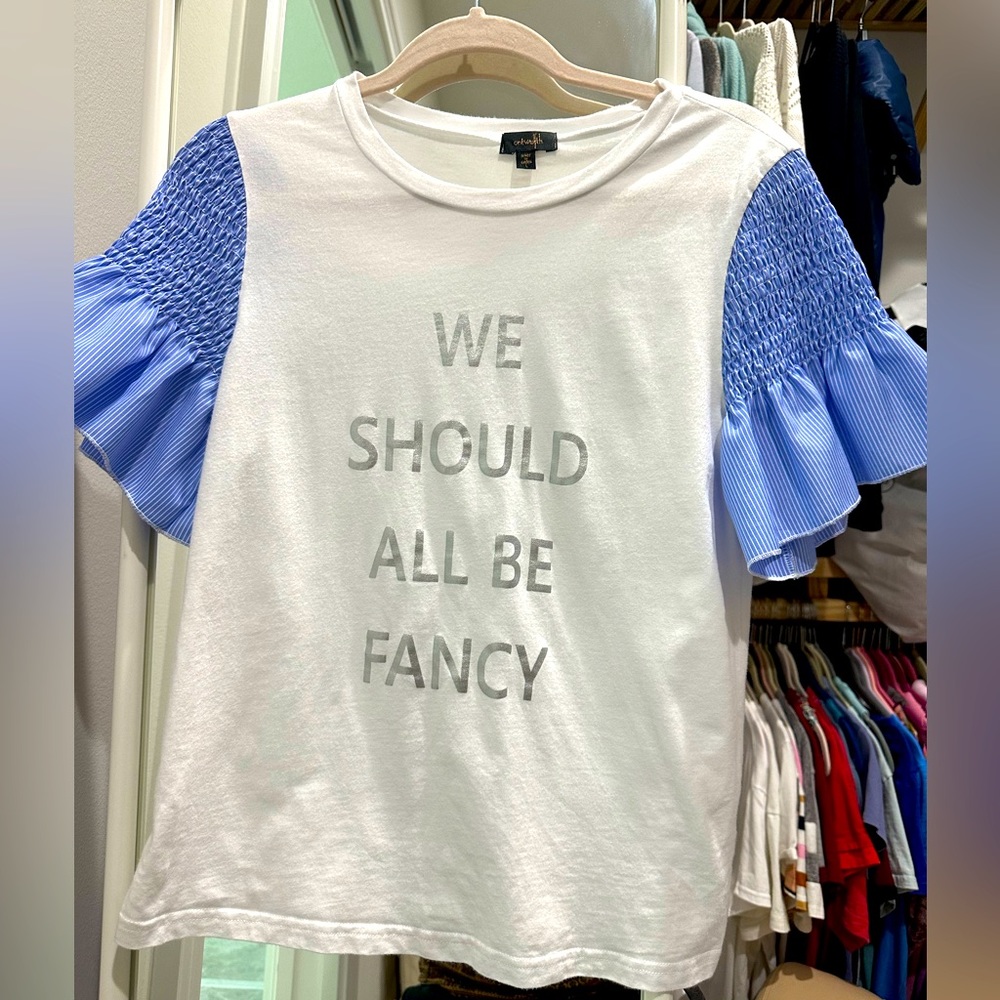 WE SHOULD ALL BE FANCY white and blue fun shirt with “fancy” pleated sleeves